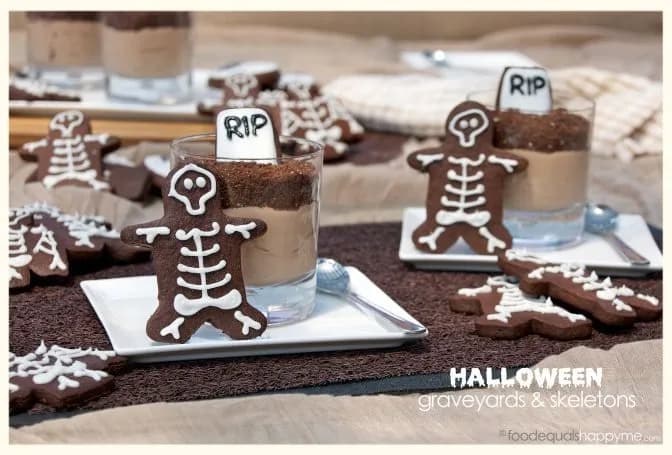 Halloween chocolate hazelnut mousse graveyard cups with cookie dirt, tombstone biscuits, and gummy worms