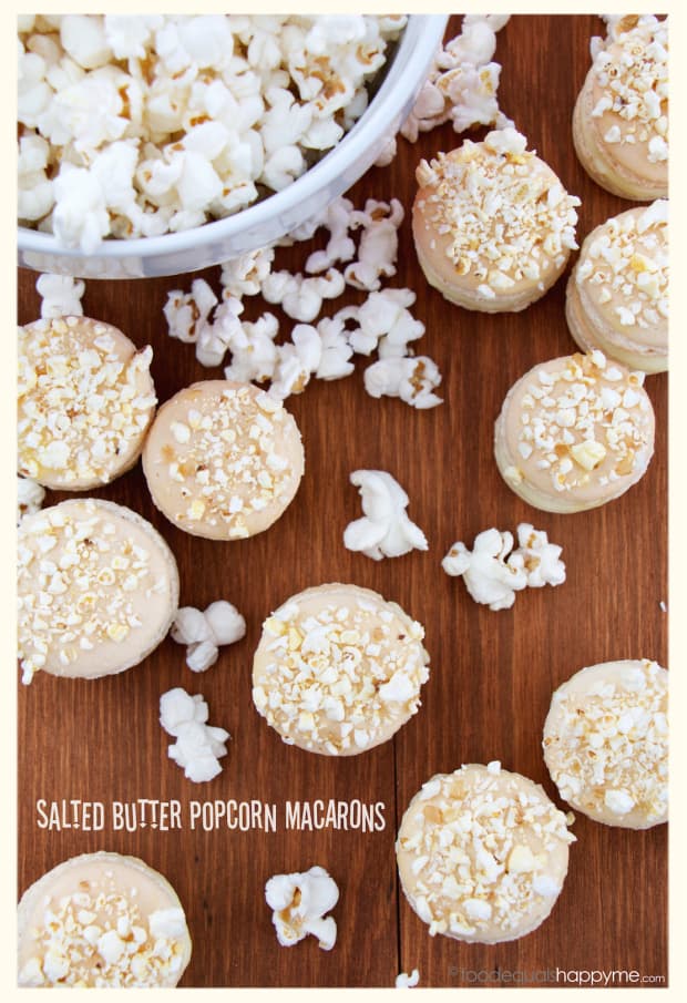 Salted butter popcorn macarons topped with crushed popcorn